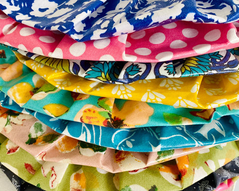 Close up of a stack of printed waterproof shower caps