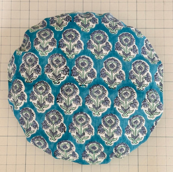 Mid blue repeating floral motif cotton bath hat