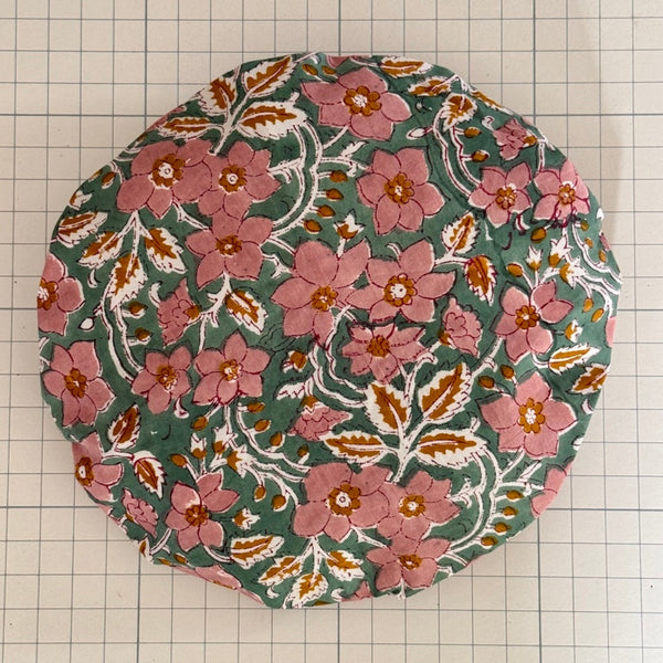 Pink, orange, white and green floral print bath hat made from cotton print