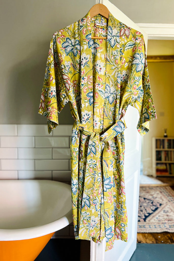 'Lime Grove' kimono made from hand-blocked printed cotton in soft lime  large scale floral motif by Caro London