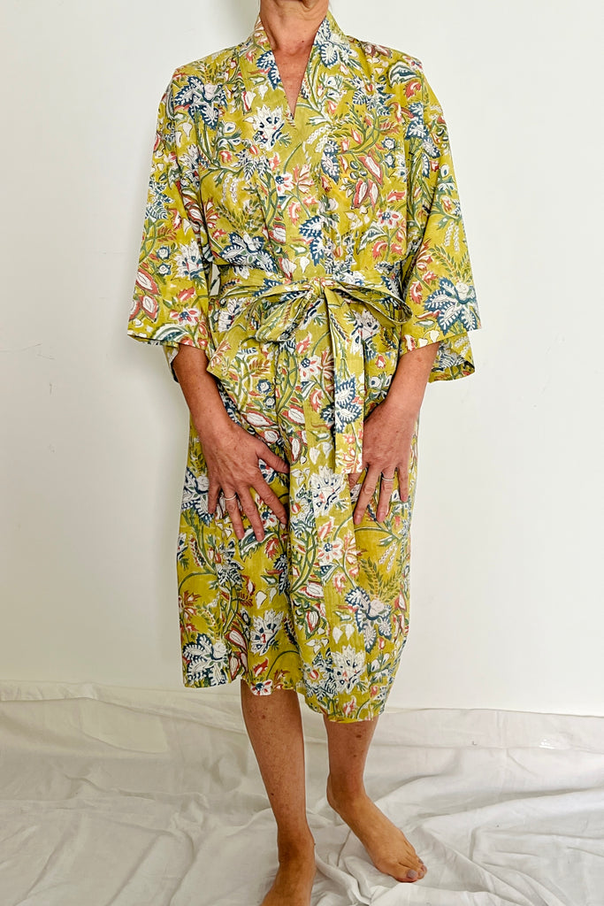 'Lime Grove' kimono made from hand-blocked printed cotton in soft lime  large scale floral motif by Caro London