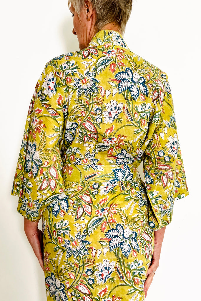 'Lime Grove' kimono made from hand-blocked printed cotton in soft lime  large scale floral motif by Caro London