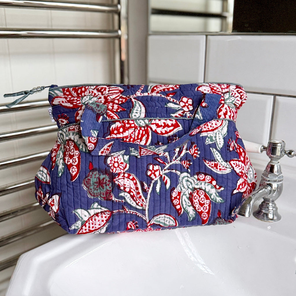 Blue and Red floral print Washbag on white sink