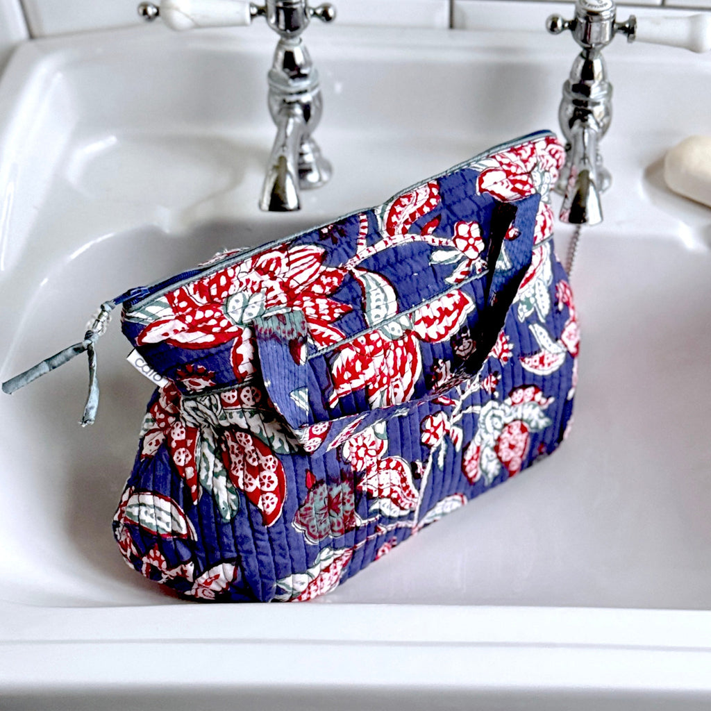 Blue and Red floral print Washbag on white sink