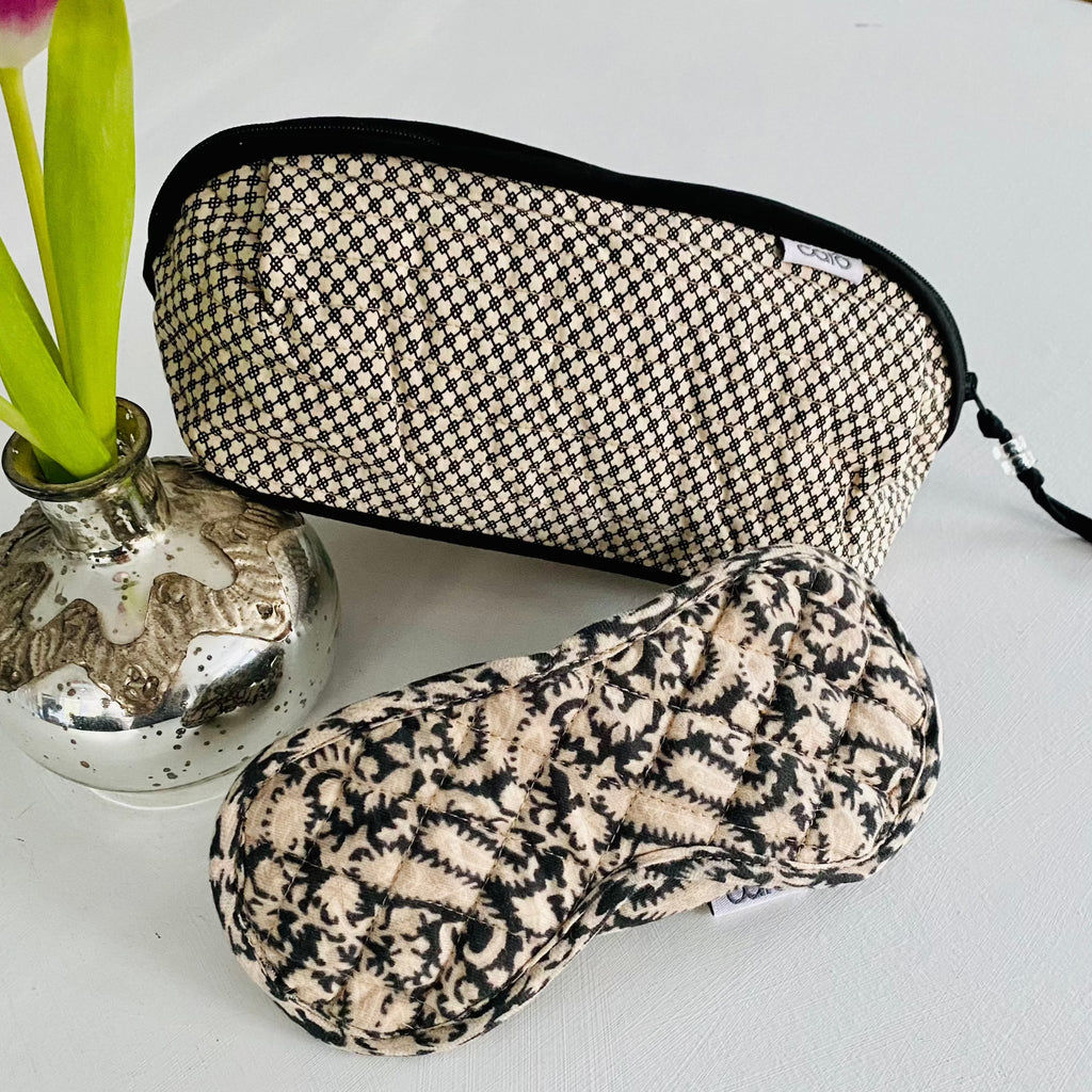 gift set with black and cream paisley quilted eye mask and long bella make up bag in cream and black mini geometric print with black trim