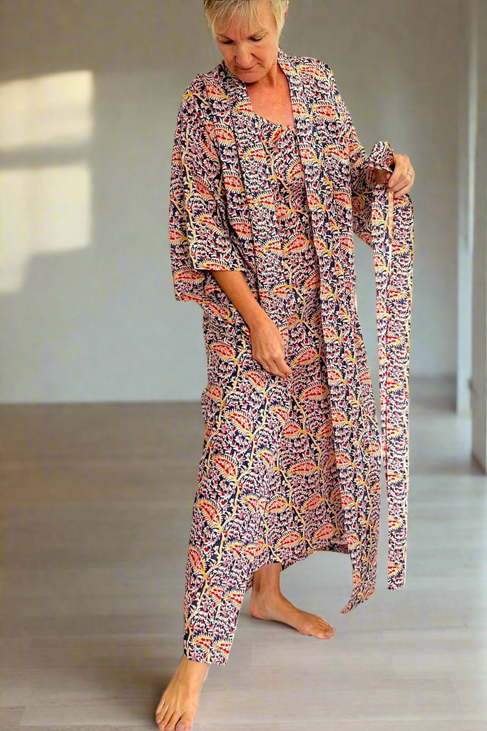 Full length Kimono robe in blue, red and yellow leaf vine all over floral printed lightweight cotton by Caro London