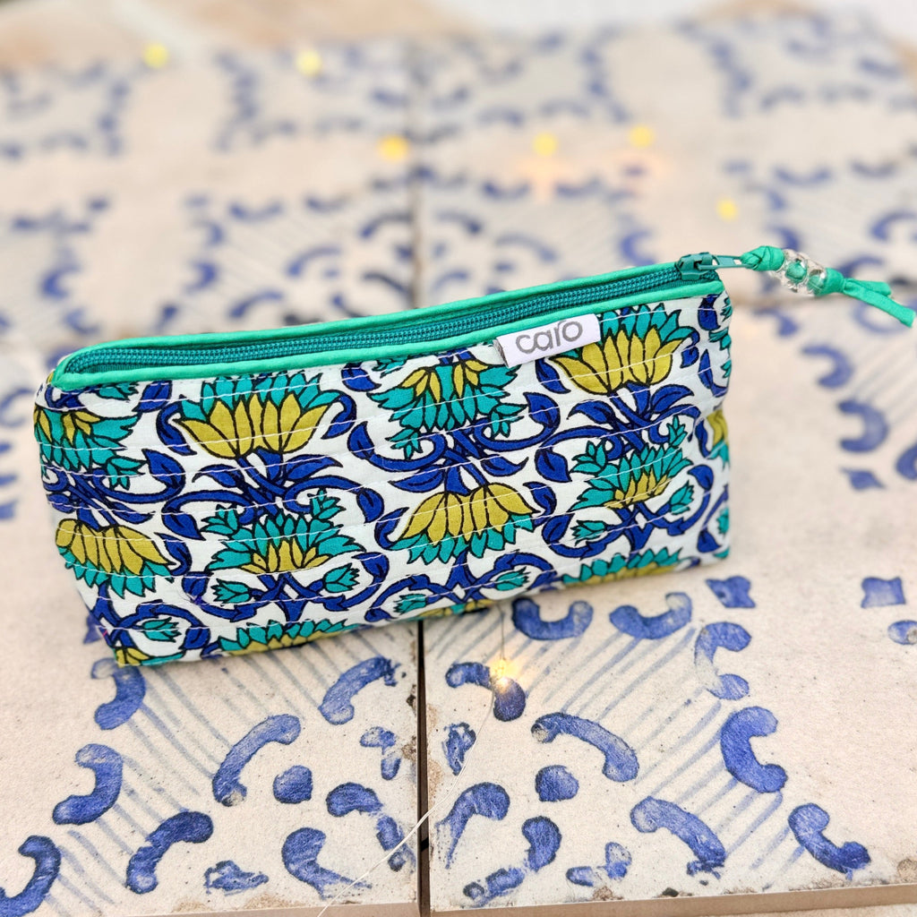 Patterned pouch with a zipper on a textured surface