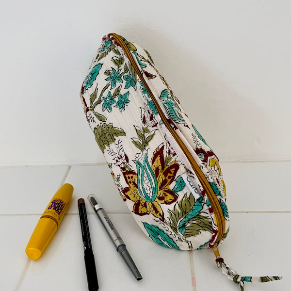 Quilted Bella_make_up_bag_in_large_scale_hand_block_print_in_green_and_turquoise_floral_by_Caro_London