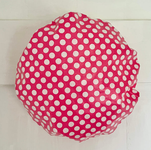 waterproofed shower cap in red and white spot print and white water resistant lining by caro london