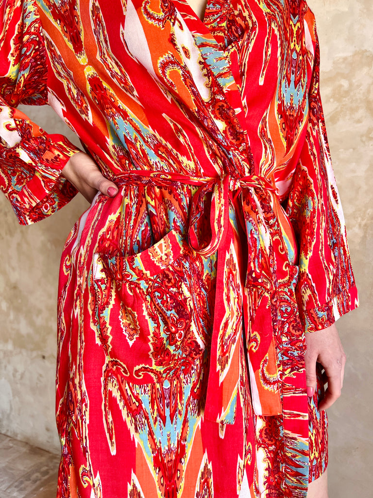 short kimono robe in red white and turquoise swirly abstract print on viscose fabric by caro london