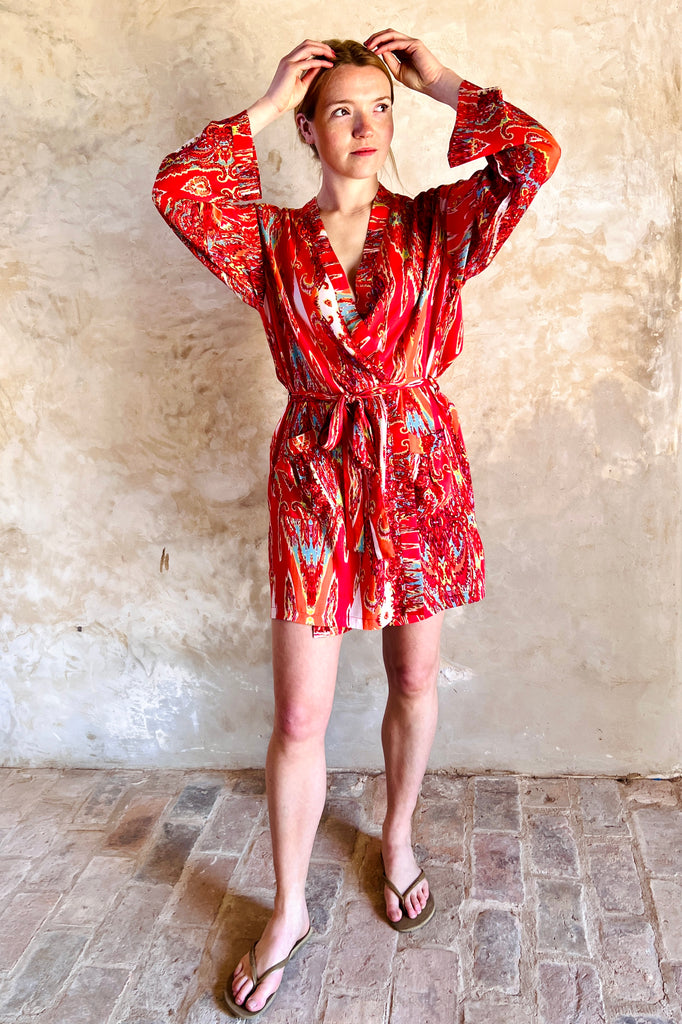 short kimono robe in red white and turquoise swirly abstract print on viscose fabric by caro london