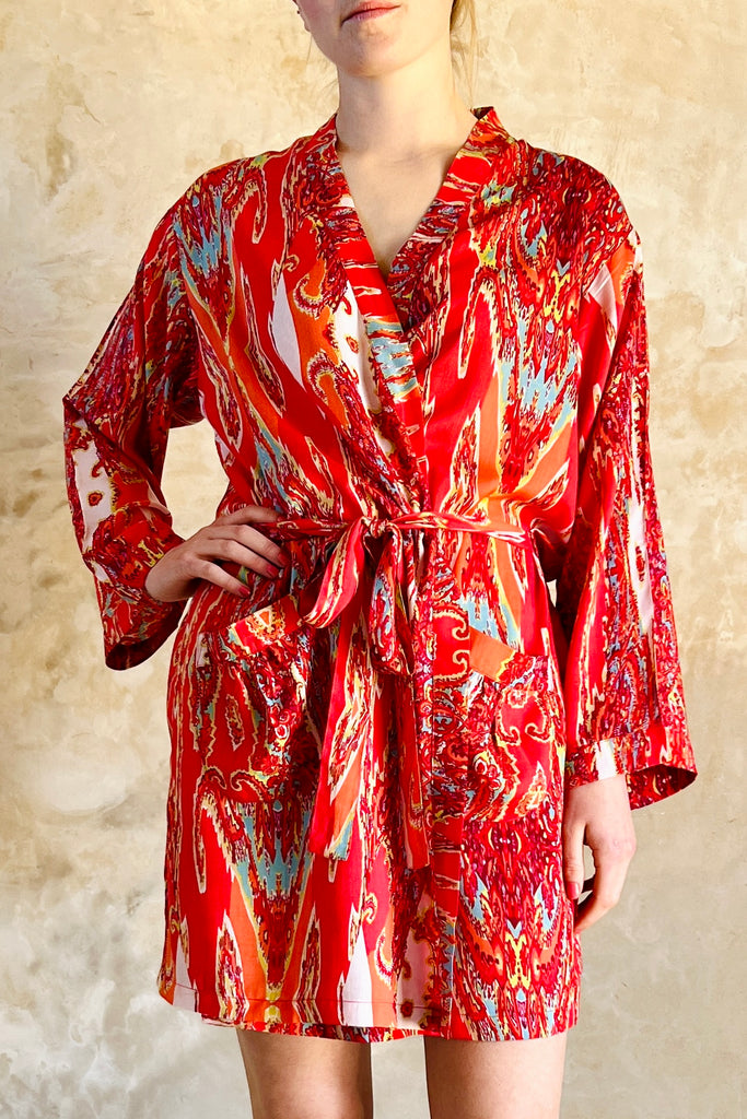 short kimono robe in red white and turquoise swirly abstract print on viscose fabric by caro london