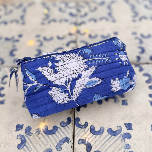 Blue floral patterned cotton cosmetic bag with quilted stitching 