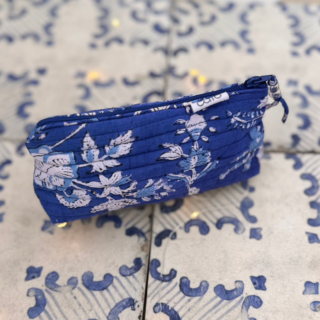 Blue floral-patterned zippered quilted make up bag