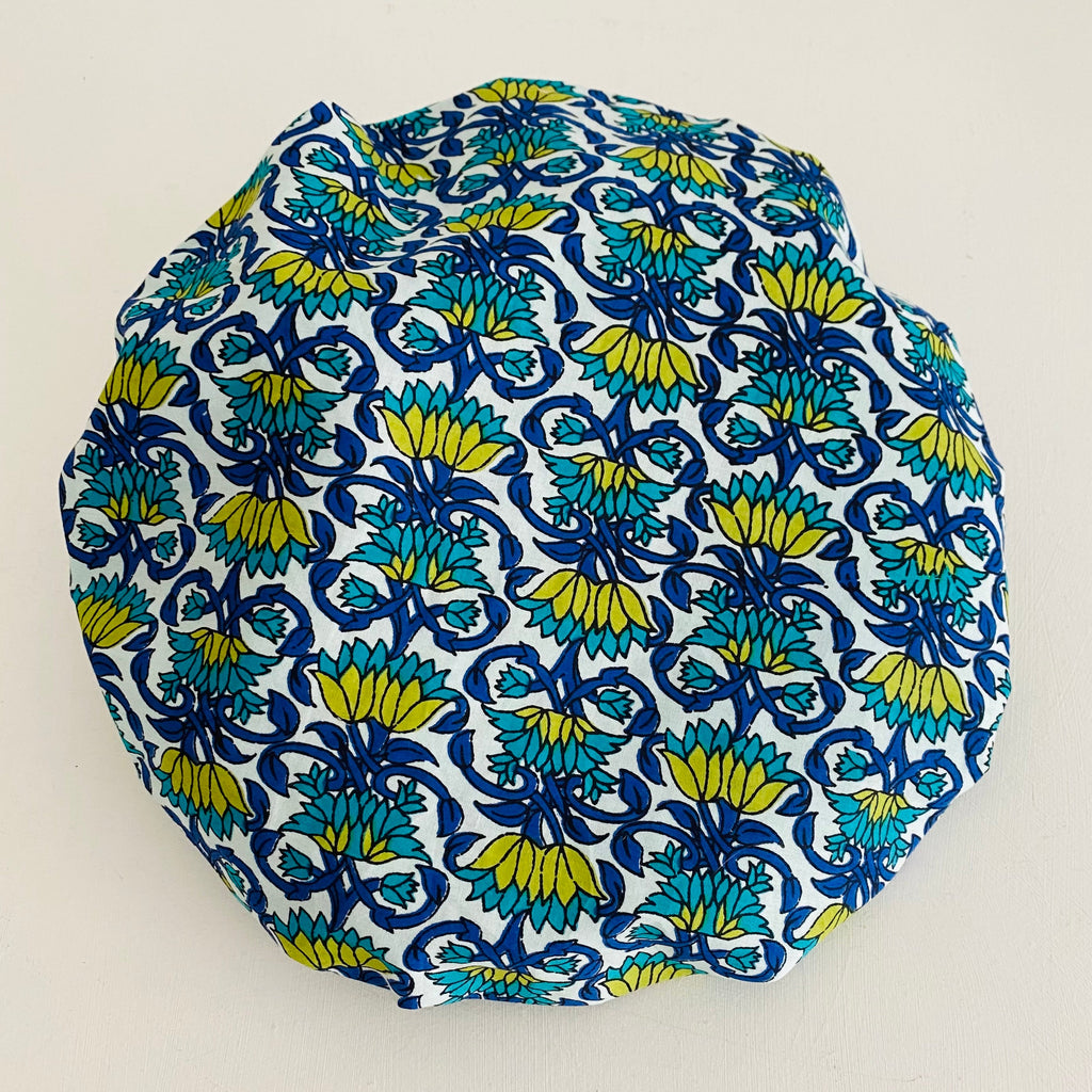 Cotton floral print bath hat with polyester lining