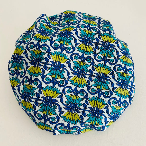 Cotton floral print bath hat with polyester lining